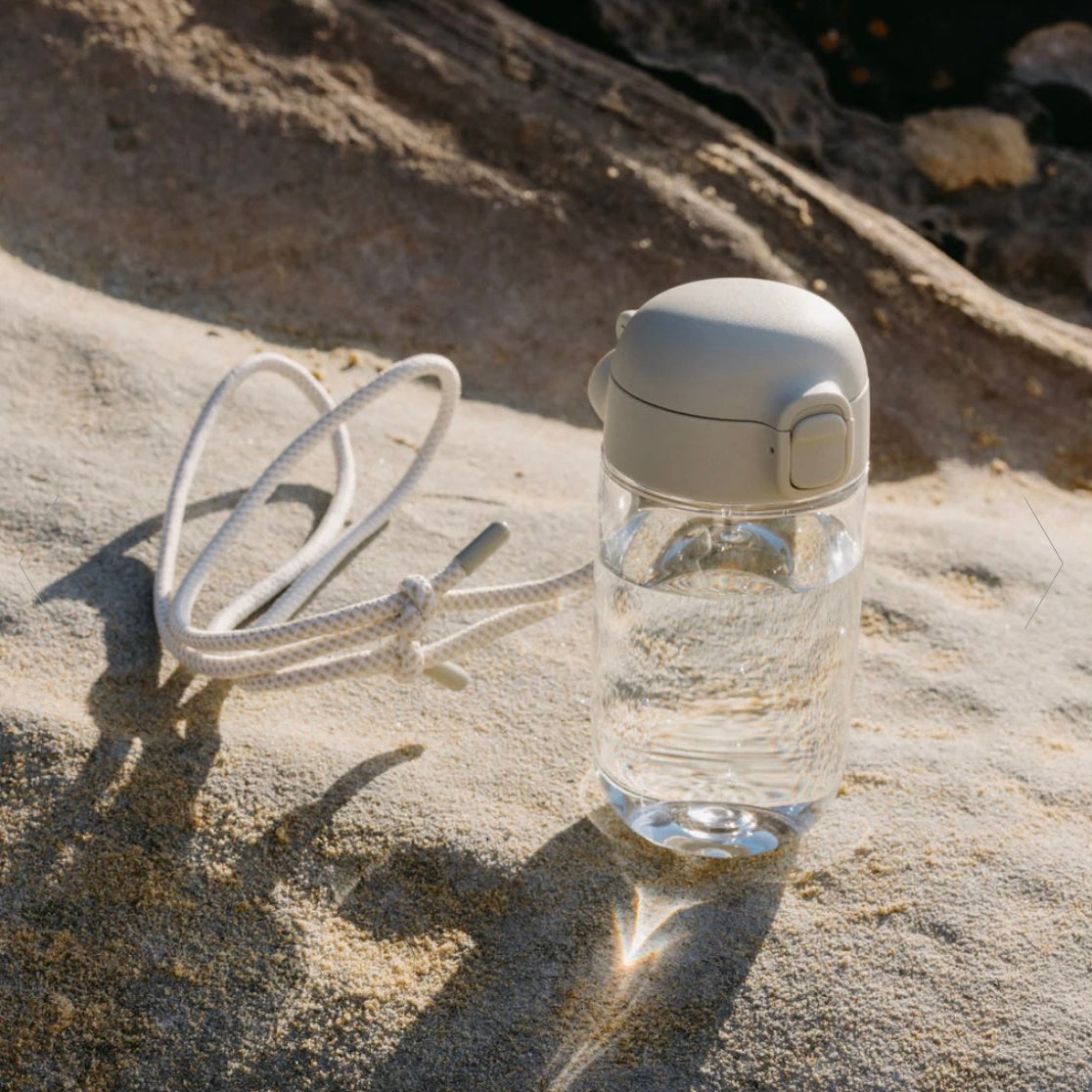 Bottle strap crème
