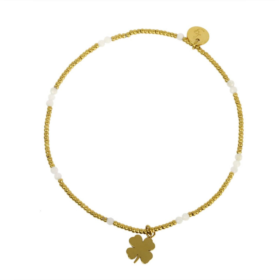 Bracelet trèfle lien élastique perles acier doré