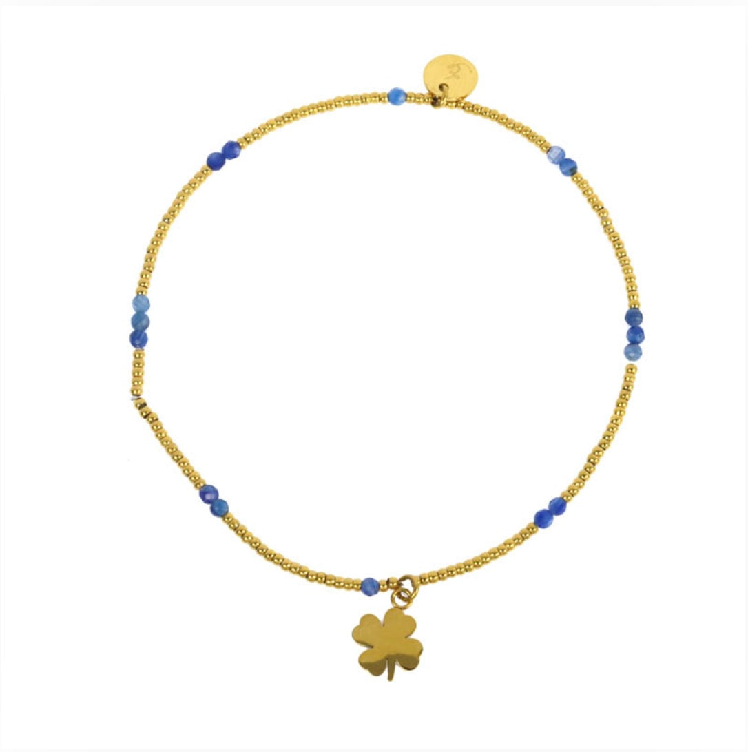 Bracelet trèfle lien élastique perles acier doré