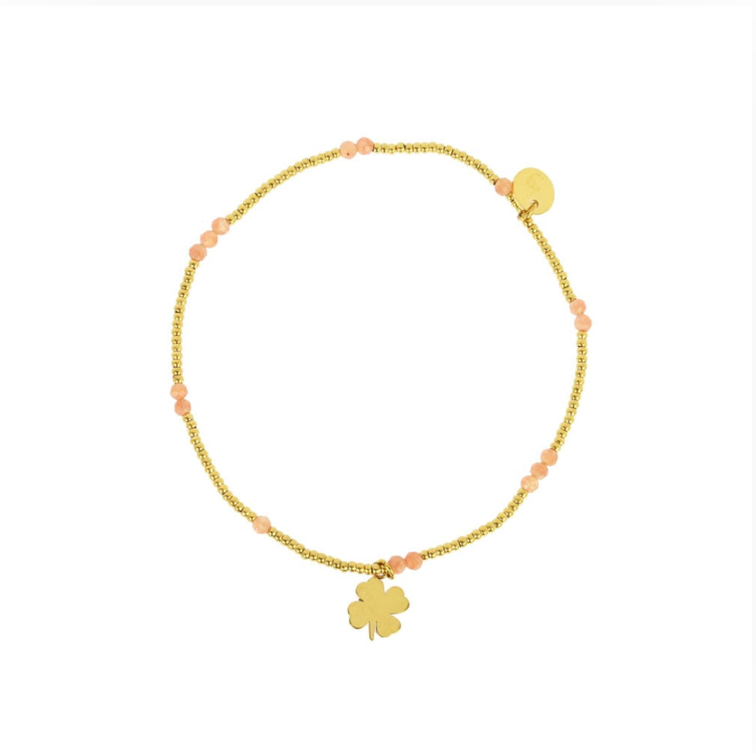 Bracelet trèfle lien élastique perles acier doré