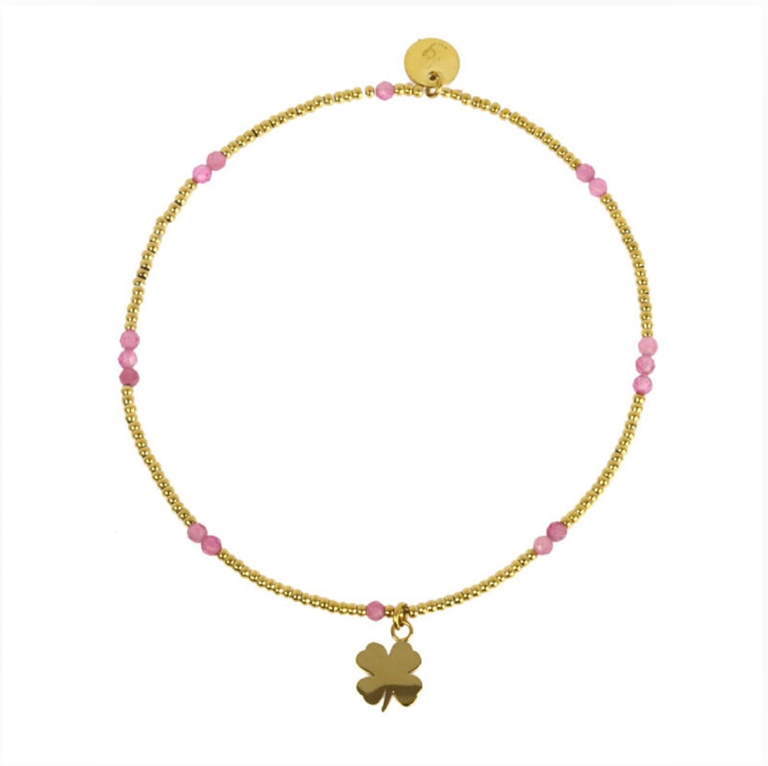 Bracelet trèfle lien élastique perles acier doré