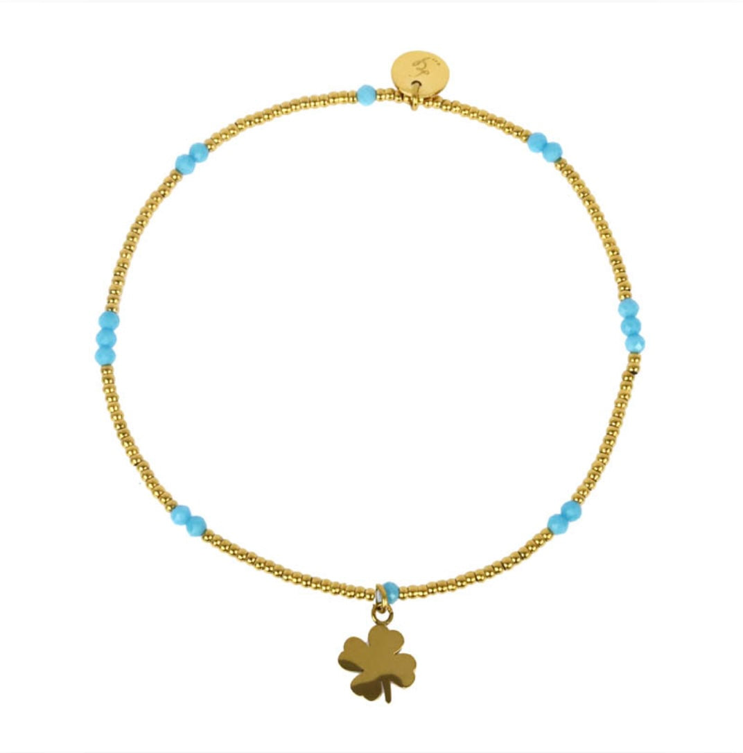 Bracelet trèfle lien élastique perles acier doré