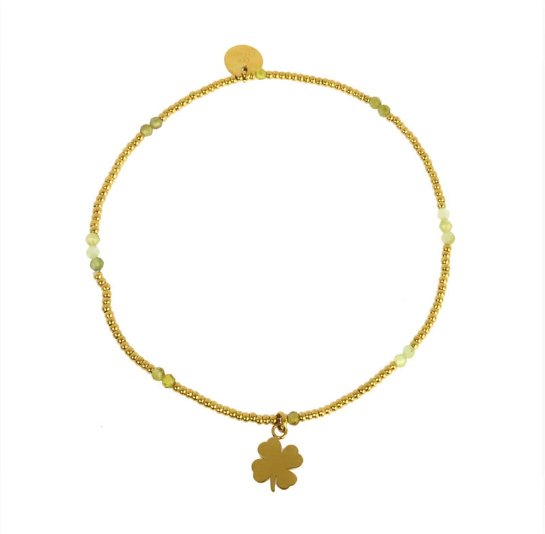 Bracelet trèfle lien élastique perles acier doré