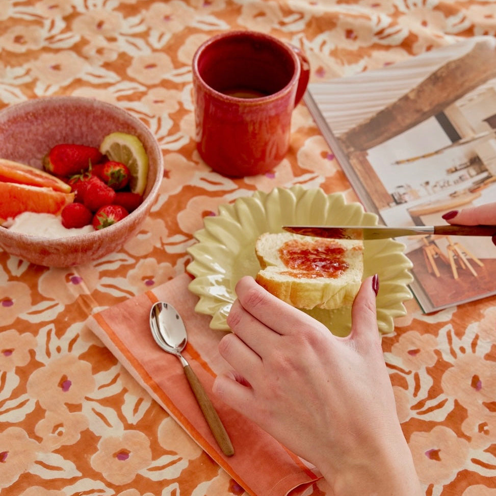 Nappe orange fleurs oranges