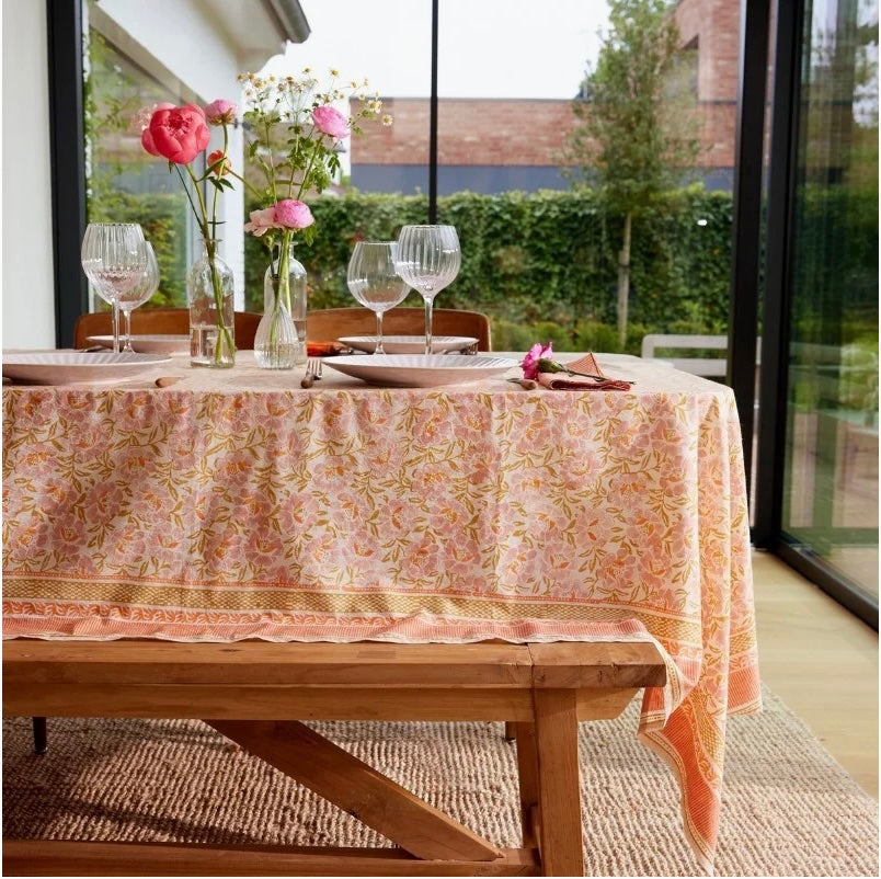 Nappe orange fleurs roses