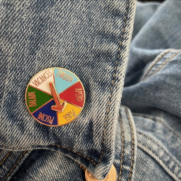 Pin's Roue des vacances