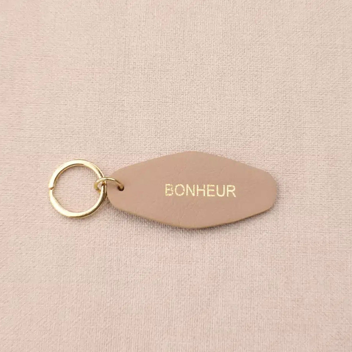 Porte clé cuir bonheur