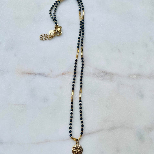 Collier perles noires et dorées