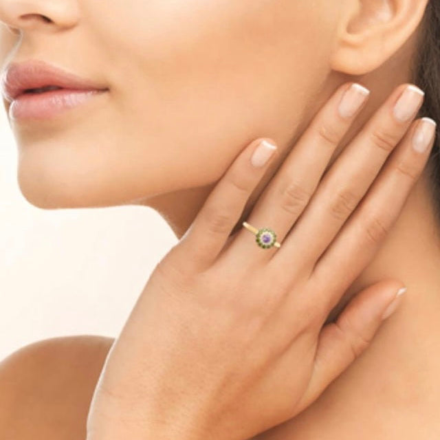 Bague ronde pierres vertes et mauve