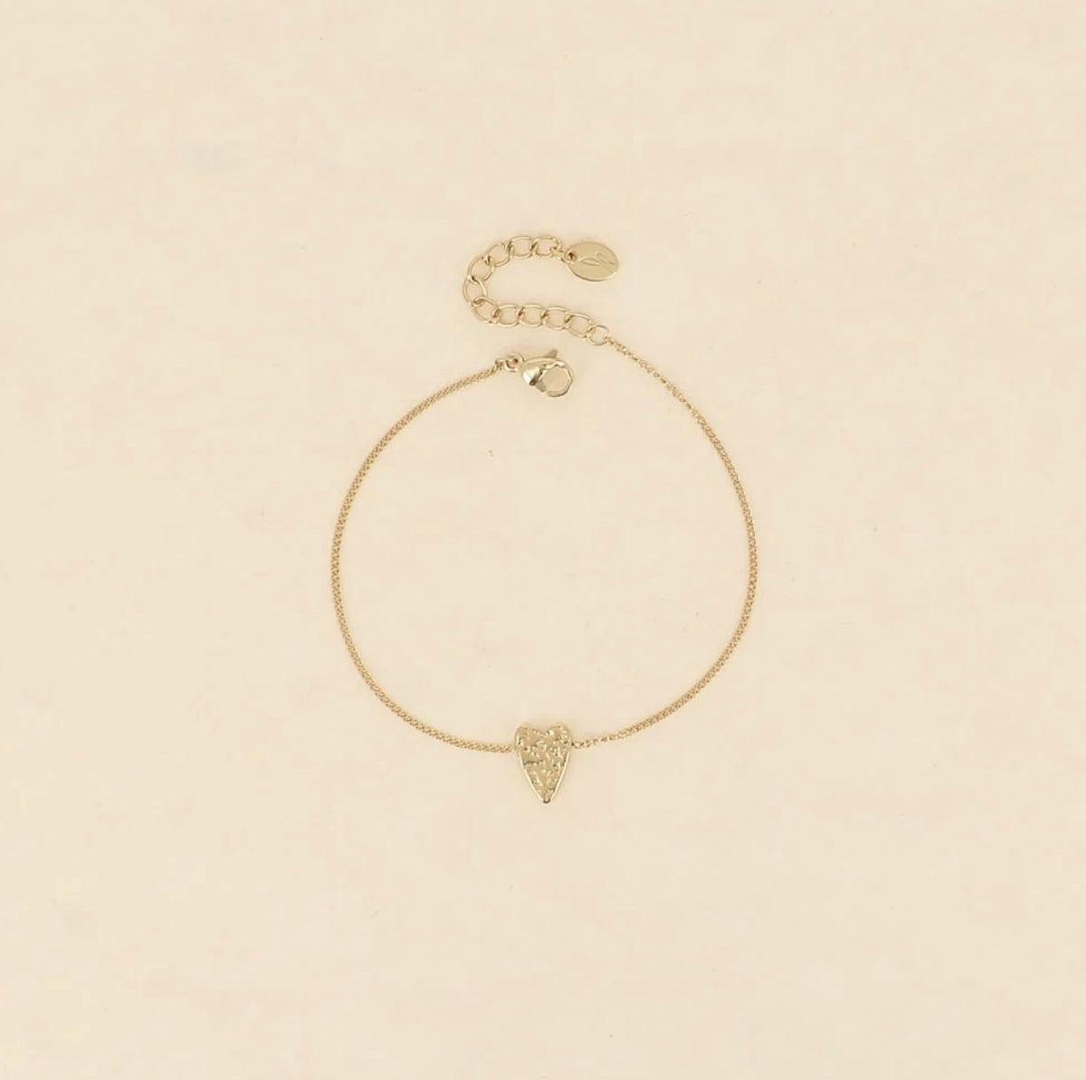 Bracelet doré coeur texturé