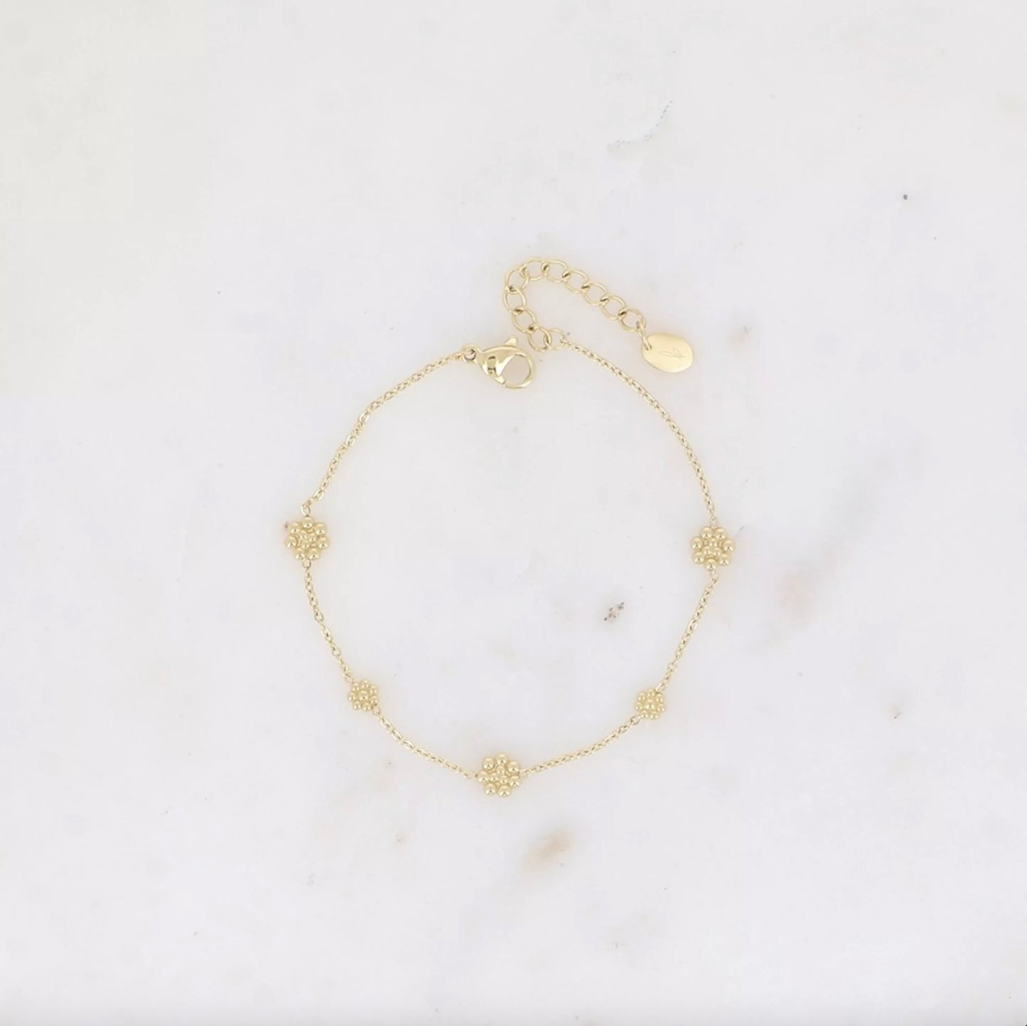 Bracelet petites fleurs dorées