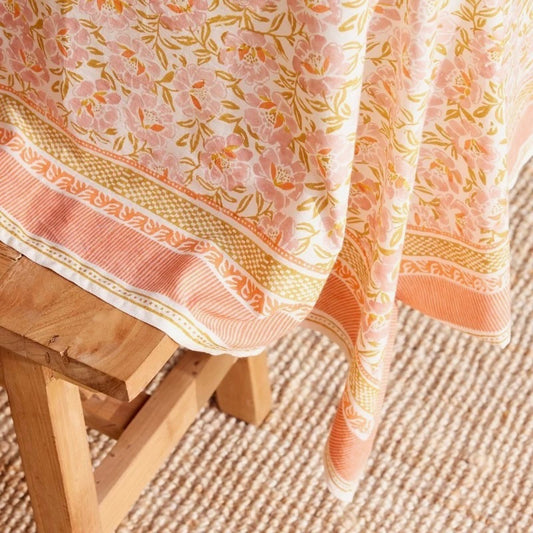 Nappe orange fleurs roses