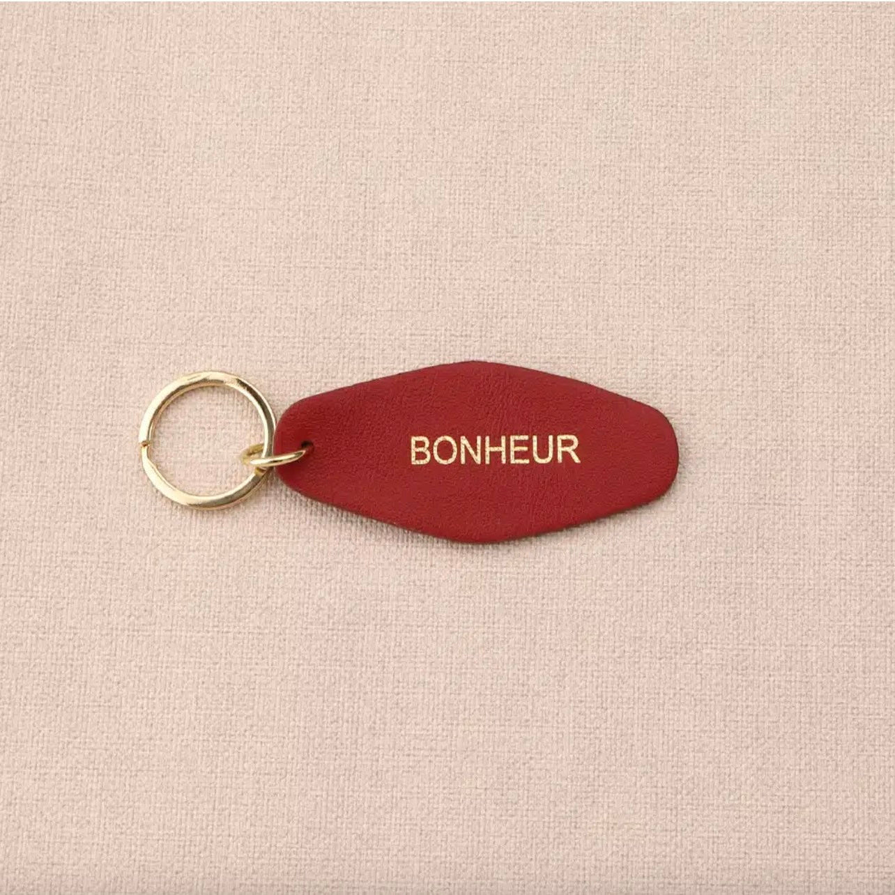 Porte clé cuir bonheur