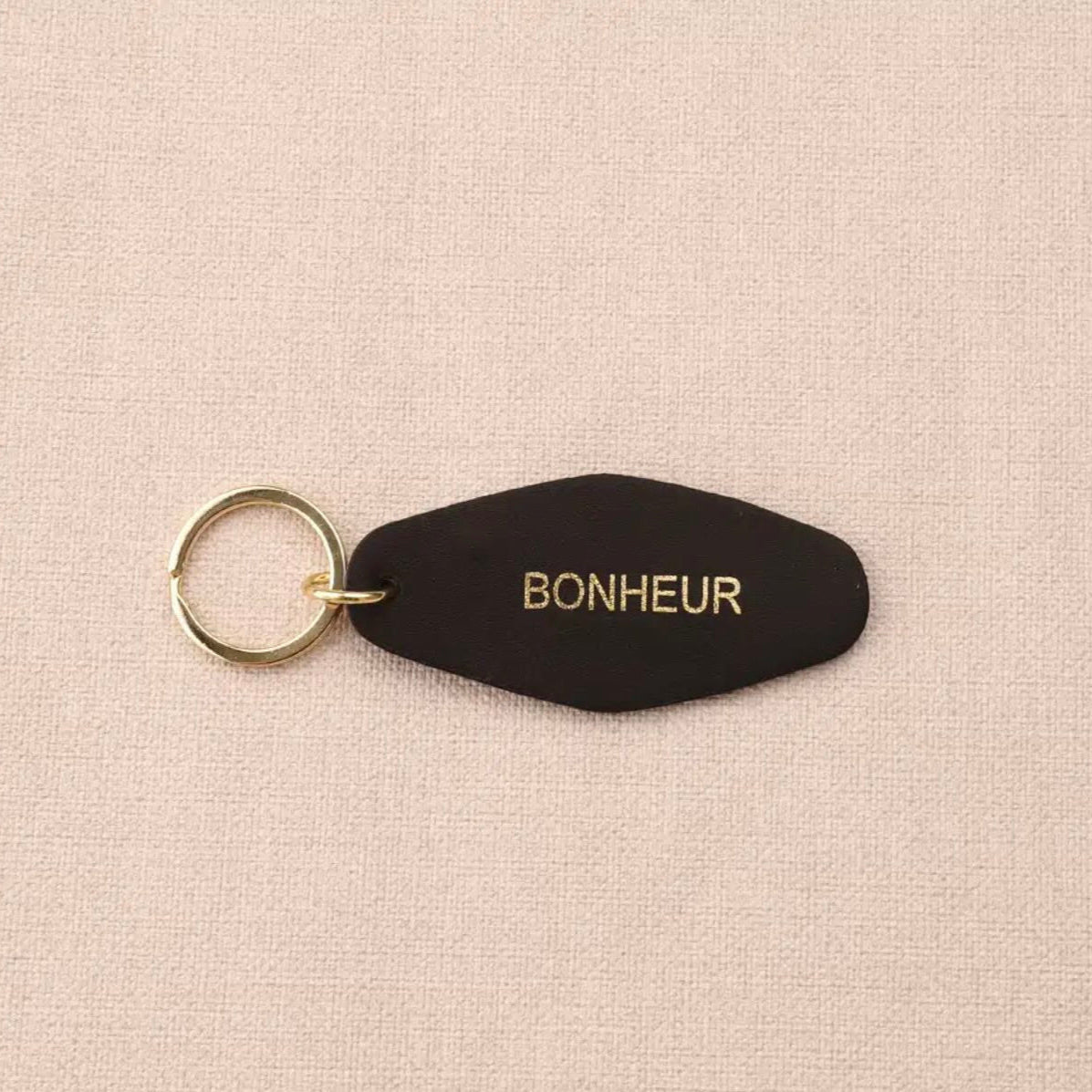 Porte clé cuir bonheur