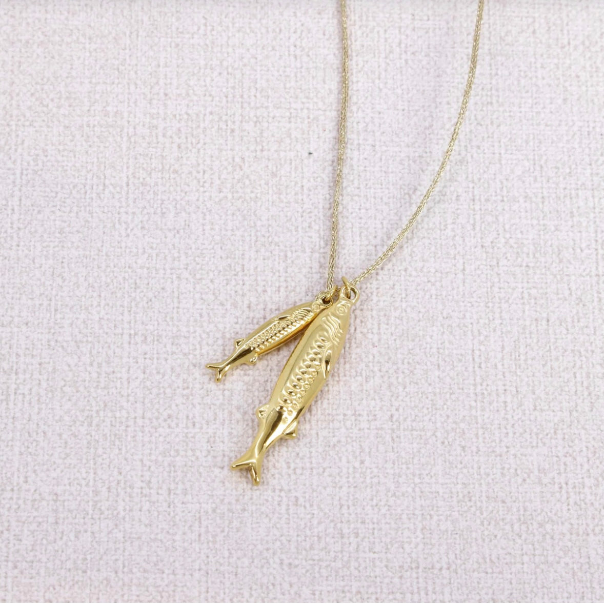 Sautoir fil 2 poissons dorés