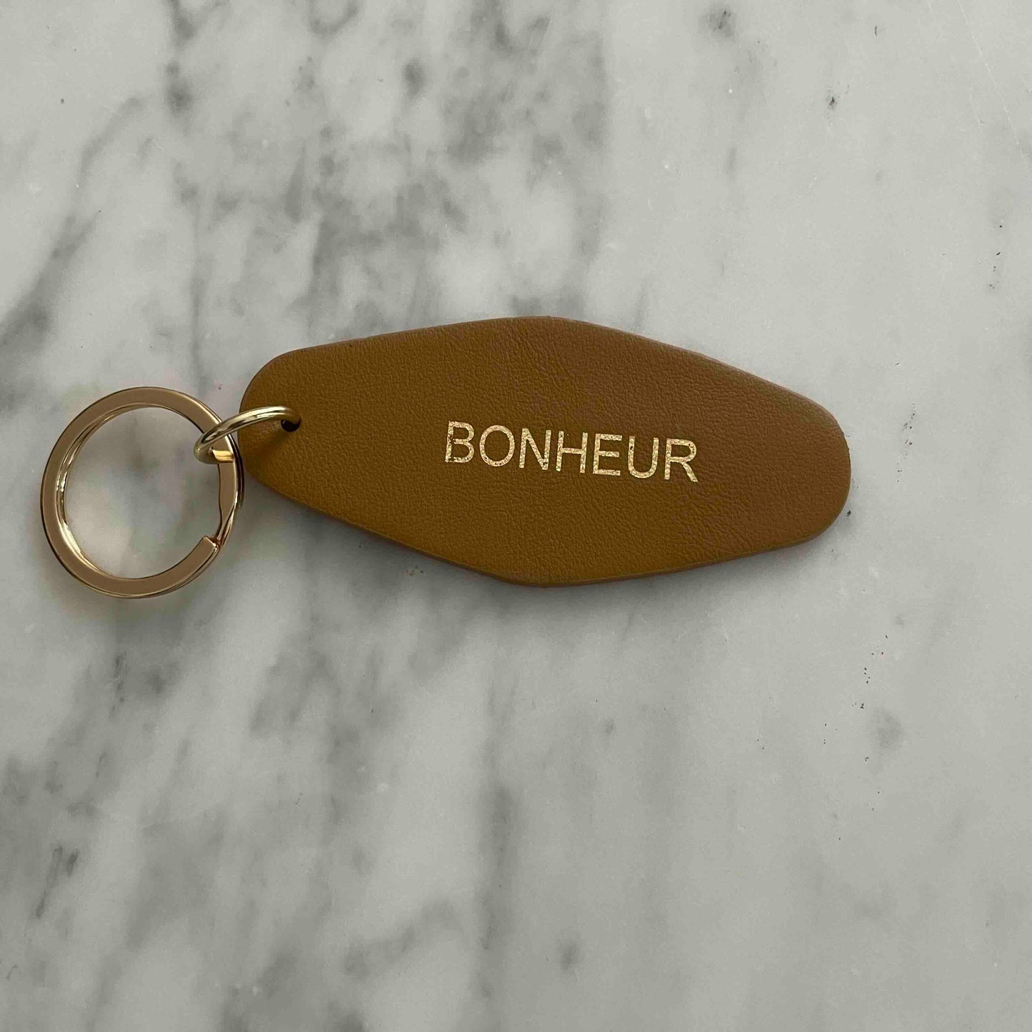 Porte clé cuir bonheur